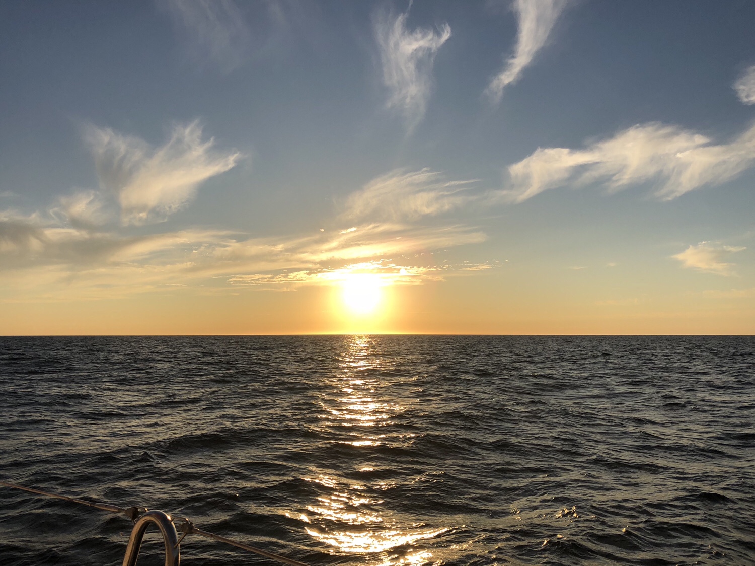 Zonsondergang bij de oversteek naar Brest